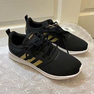 NWT Adidas running shoes black gold 8.5us never worn